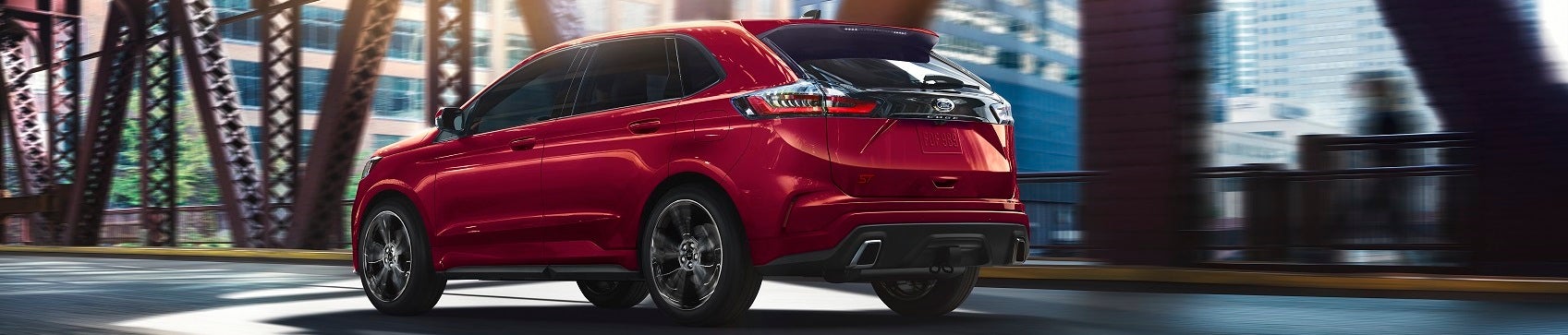 New Ford Edge Driving Over a Bridge