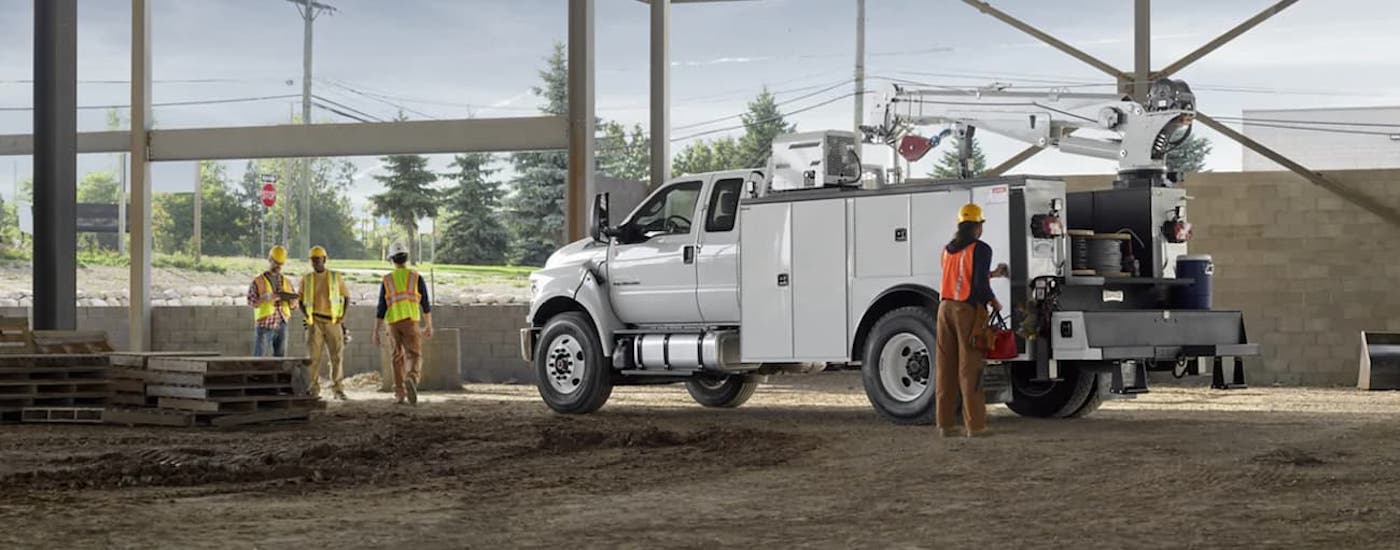 Rear of a white 2021 Ford F-750 on a job site