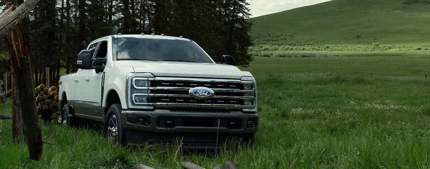 White 2026 Ford F-250 parked off-road.