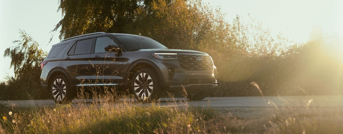 A black 2025 Ford Explorer on a sunny day.